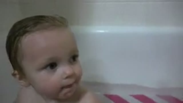 WESTMINSTER COLORADO-2015: Toddler Enjoying Bath Time and Playing with Bacon