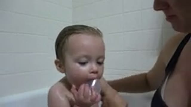 WESTMINSTER COLORADO-2015: A Child Being Bathed By A Caretaker Beautifully And
