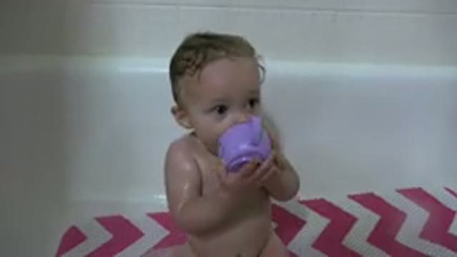 WESTMINSTER COLORADO-2015: Baby Sitting In A Bathtub Covered With Water