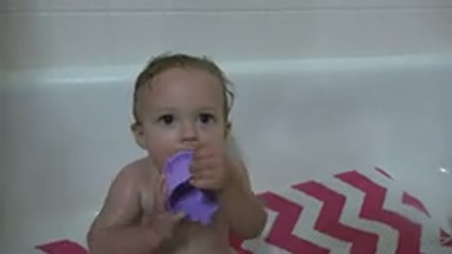 WESTMINSTER COLORADO-2015: A Cute Little Baby Plays With A Purple Cup After