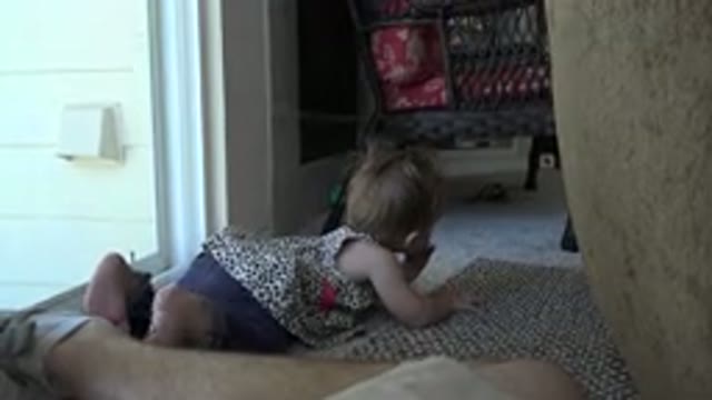 WESTMINSTER COLORADO-2015: Young Child Is Walking On All Fours On The Carpet Of