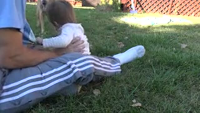 WESTMINSTER COLORADO-2015: Cute Little Toddler Playing on Grass