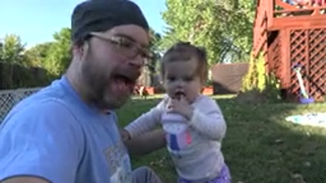 WESTMINSTER COLORADO-2015: Happy Father With His Daughter Playing in Backyard