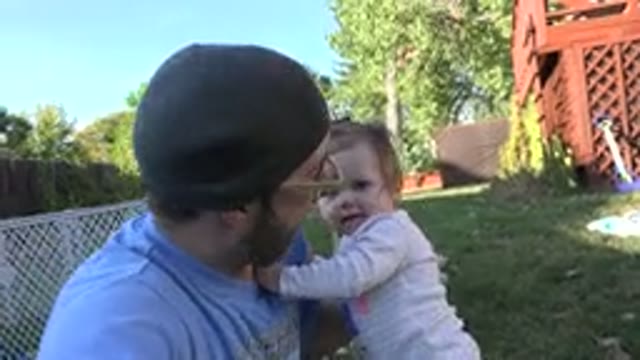 WESTMINSTER COLORADO-2015: A Man And Another Person Are Embracing In Front Of