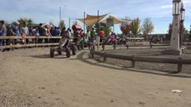 BRIGHTON COLORADO-2015: Kids Have Fun In Toy Car Competition Race On Dirt Road