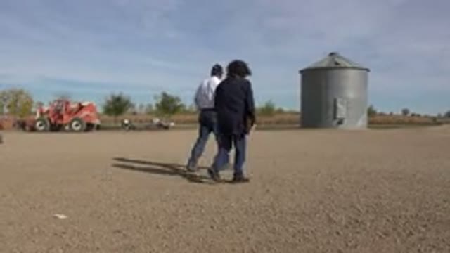 BRIGHTON COLORADO-2015: Two Gentlemen Walking and Conversing