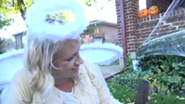 WESTMINSTER COLORADO-2015: Woman With White Angel Wings And Halo Enjoys