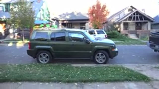 WESTMINSTER COLORADO-2015: Street In A Suburban Neighborhood With Houses And Trees