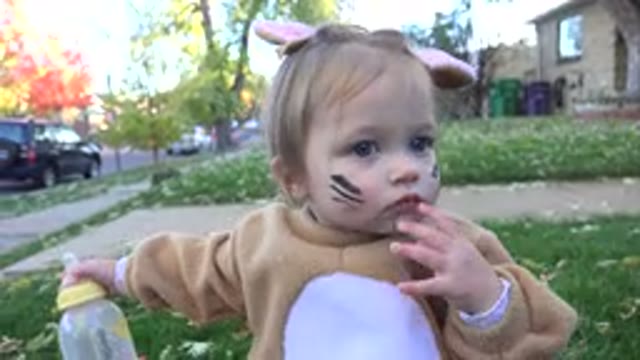 WESTMINSTER COLORADO-2015: Baby In A Rabbit Suit Sucking Finger And Holding Bottle