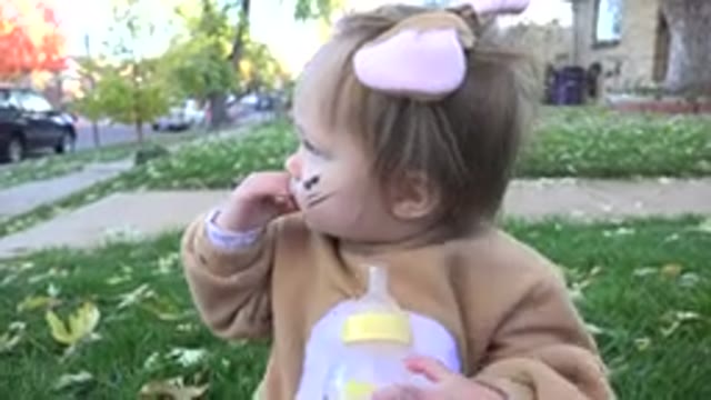 WESTMINSTER COLORADO-2015: Pretty Little Dirty Face Baby Sitting On The Front Lawn