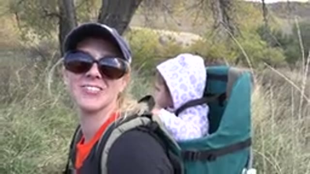 GOLDEN COLORADO-2015: Woman Walks With Baby And Dog In Forest