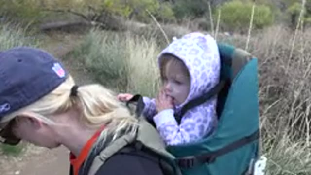 GOLDEN COLORADO-2015: Family Contemplating Nature On A Trail With Their Baby In