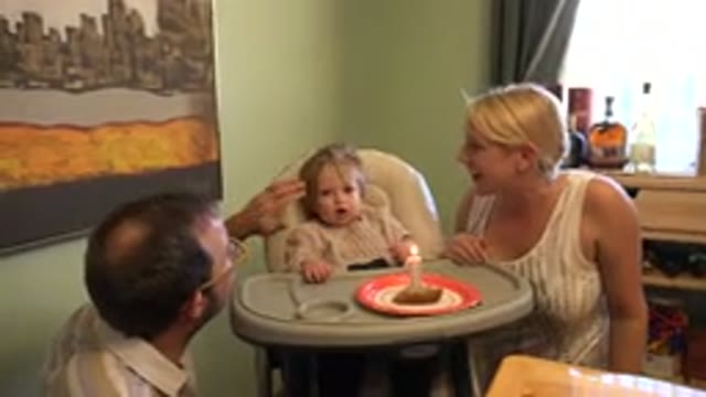 WESTMINSTER COLORADO-2015: Toddler Sitting On A High Rise Chair While Her Mother