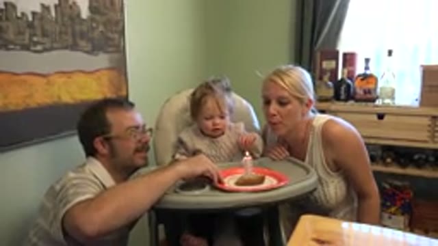WESTMINSTER COLORADO-2015: Young Family Enjoying Baby's First Birthday With Cake