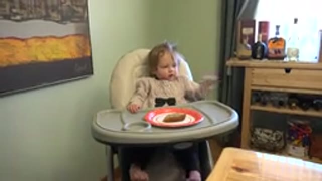WESTMINSTER COLORADO-2015: Cute Toddler Sitting On Her High Rise Chair With Her