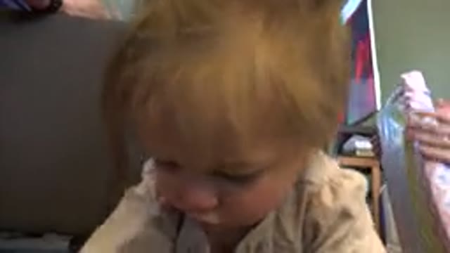 WESTMINSTER COLORADO-2015: Toddler Wearing White Shirt Holds Pink and White Rabbit-Shaped Card