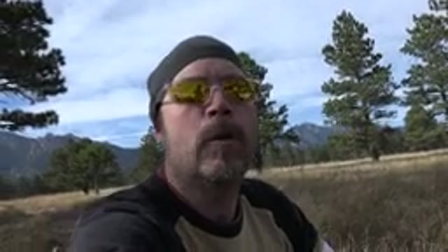 GOLDEN COLORADO-2015: A Man Showing Off His Family Consisting Of A Woman A Brown Dog And Baby
