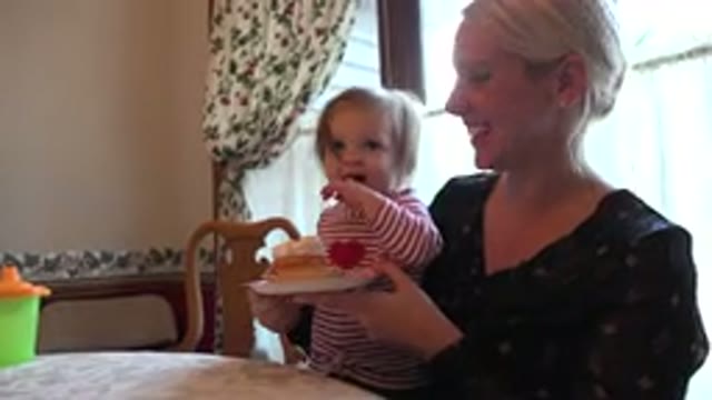 PRAIRIE GROVE ILLINOIS-2015: The Baby Enjoying Eating The Cupcake
