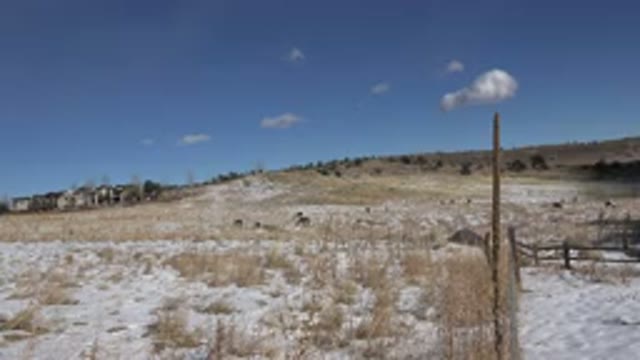 GOLDEN COLORADO-2015: Deserted Hillside Showing Patches of Clouds