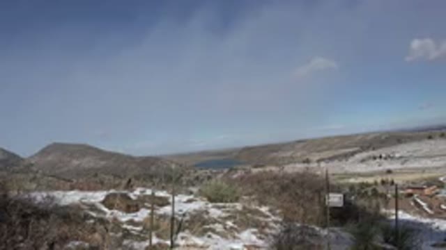 GOLDEN COLORADO-2015: A Terrain With Snow Covering It Filmed In The Brightest