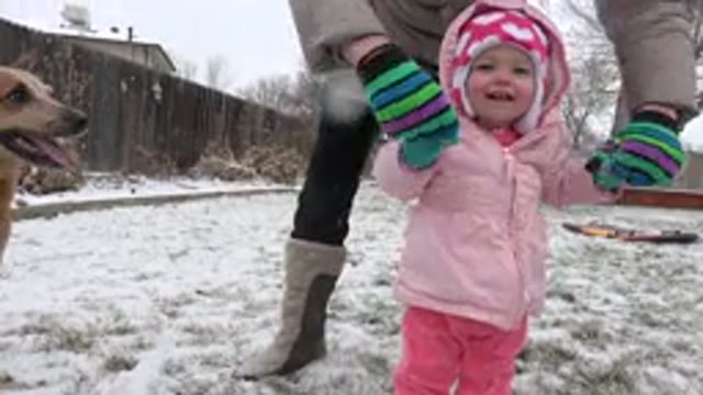 WESTMINSTER COLORADO-2015: A Little Girl Wearing Pink Long Sleeve Clothing In Snow