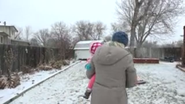 WESTMINSTER COLORADO-2015: Mother With Her Daughter Playing In The Yard Of Her