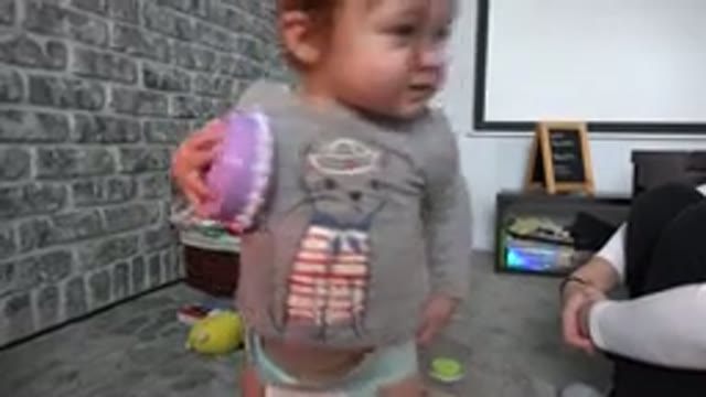 WESTMINSTER COLORADO-2015: Happy Baby Playing While Mom Watching