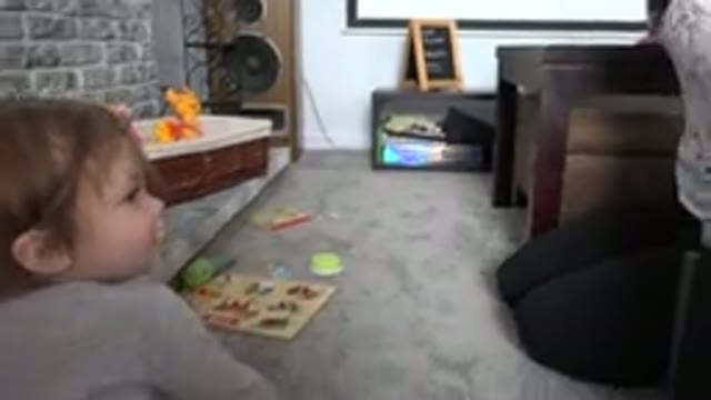 WESTMINSTER COLORADO-2015: Little Toddler Crawling Around On The Floor Near Toys