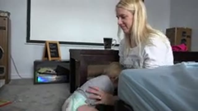 WESTMINSTER COLORADO-2015: Blonde Woman in White Shirt Catches Baby Child