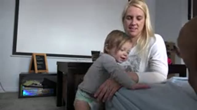WESTMINSTER COLORADO-2015: Mom And Daughter Sitting In House And Playing