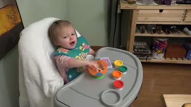 WESTMINSTER COLORADO-2015: Baby Sitting In A Chair And Eating Something From A Bowl