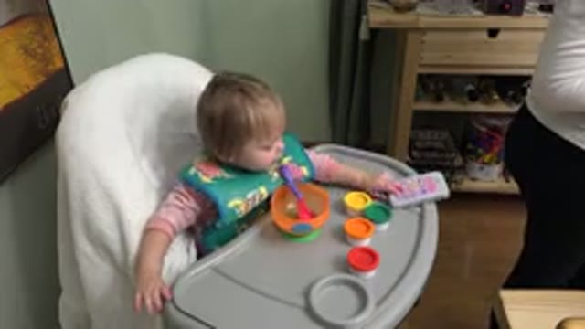 WESTMINSTER COLORADO-2015: Small Baby Sitting In The Baby Chair Trying To Play