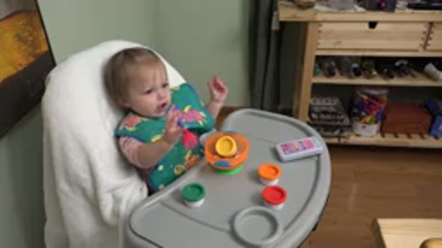 WESTMINSTER COLORADO-2015: Baby Girl Sitting and Eating Alone in a High Chair