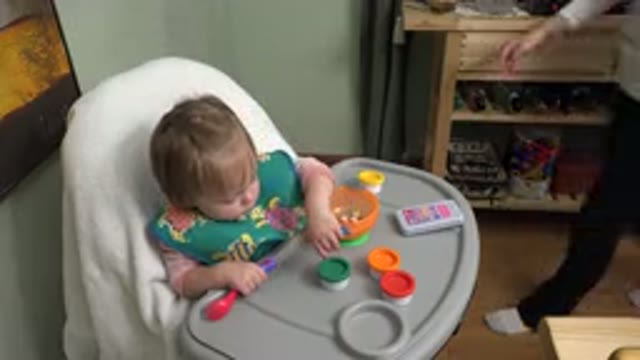 WESTMINSTER COLORADO-2015: Baby Eats Food From Different Containers And Plays