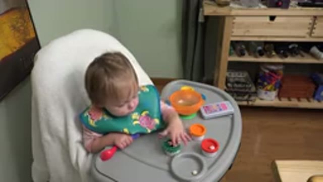 WESTMINSTER COLORADO-2015: Little Girl Eating Lunch at Daycare