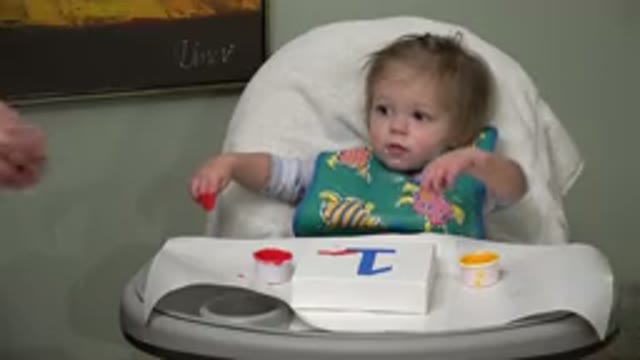 WESTMINSTER COLORADO-2015: Baby Sitting In Chair And Doing Art With Paint