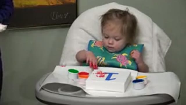 WESTMINSTER COLORADO-2015: Lap Girl Playing in Car Seat with Learning Materials