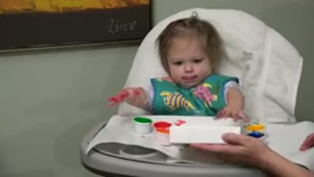WESTMINSTER COLORADO-2015: Baby In A Highchair Playing With Paints And Number