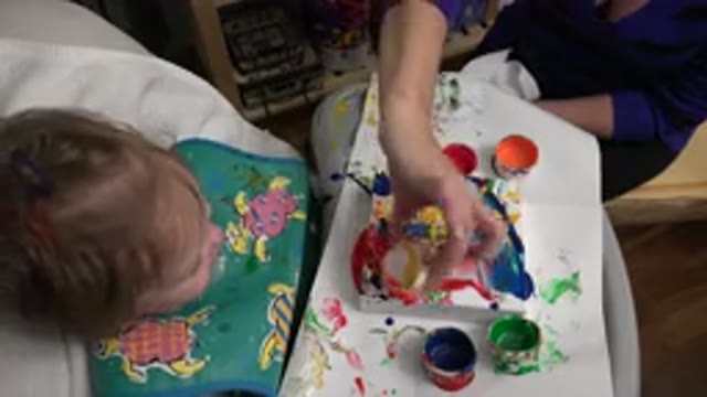 WESTMINSTER COLORADO-2015: Mom And Daughter Sitting In A House Playing With