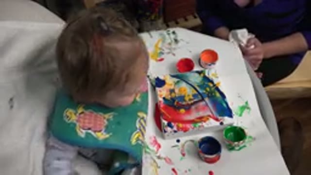 WESTMINSTER COLORADO-2015: Child Plays With Mother in Her Chair