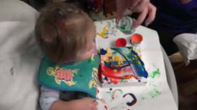 WESTMINSTER COLORADO-2015: Child Gets Dirty Playing Making Art With Paint