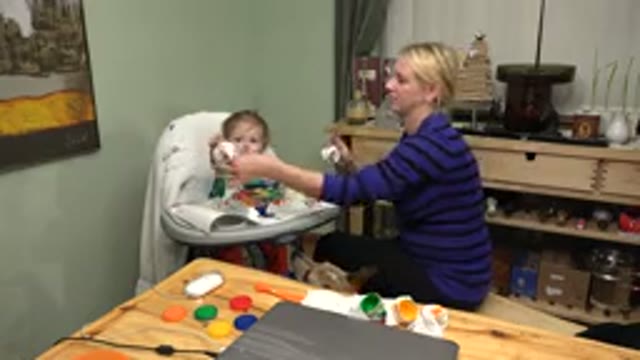 WESTMINSTER COLORADO-2015: Woman Wearing Purple Sweater Wipes Hands With White