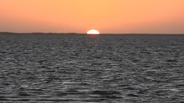 SAN CARLOS BCS MEXICO-2022: Sunset over the Ocean with Gentle Waves