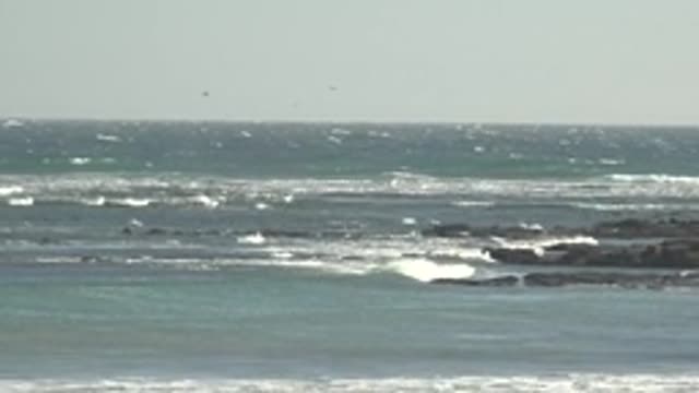 LA BOCANA BCS MEXICO-2022: Waves Crashing Against Rocky Shoreline