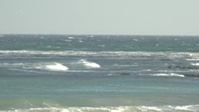 LA BOCANA BCS MEXICO-2022: Ocean Waves Crashing Against Rocky Shore