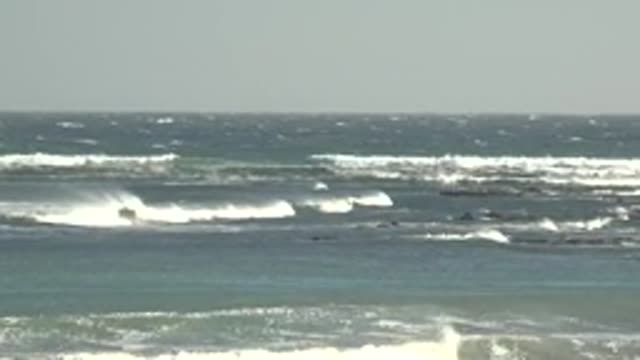 LA BOCANA BCS MEXICO-2022: Ocean Waves Crashing Against Rocky Shore