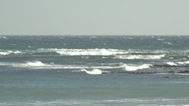 LA BOCANA BCS MEXICO-2022: Waves Breaking on Rocky Ocean Shore