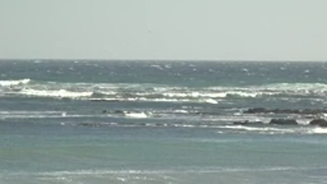 LA BOCANA BCS MEXICO-2022: Waves Breaking on Rocky Ocean Shore