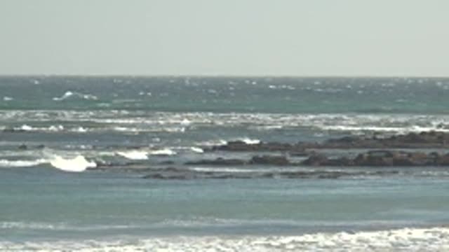 LA BOCANA BCS MEXICO-2022: Waves Crashing Against Rocky Shoreline