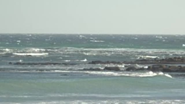 LA BOCANA BCS MEXICO-2022: Waves Crashing Against Rocky Shoreline